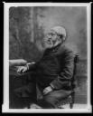 "Benjamin Harrison, three-quarter length portrait, seated, facing left, with right hand on table"